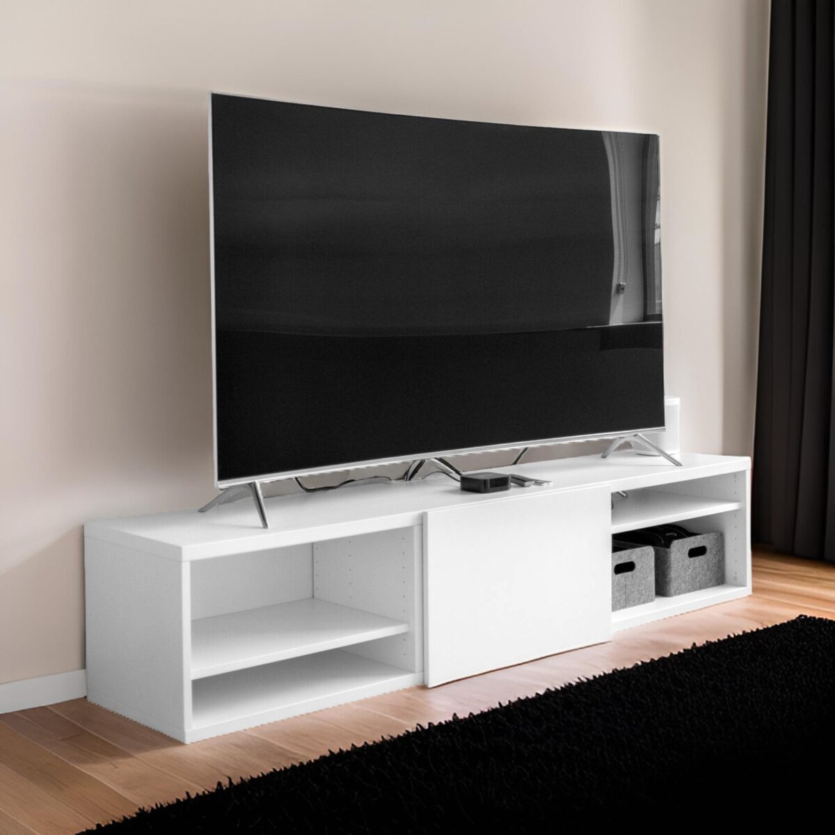 gray flat screen TV on white TV stand scaled 1738468616158 @LuzanoFurniture